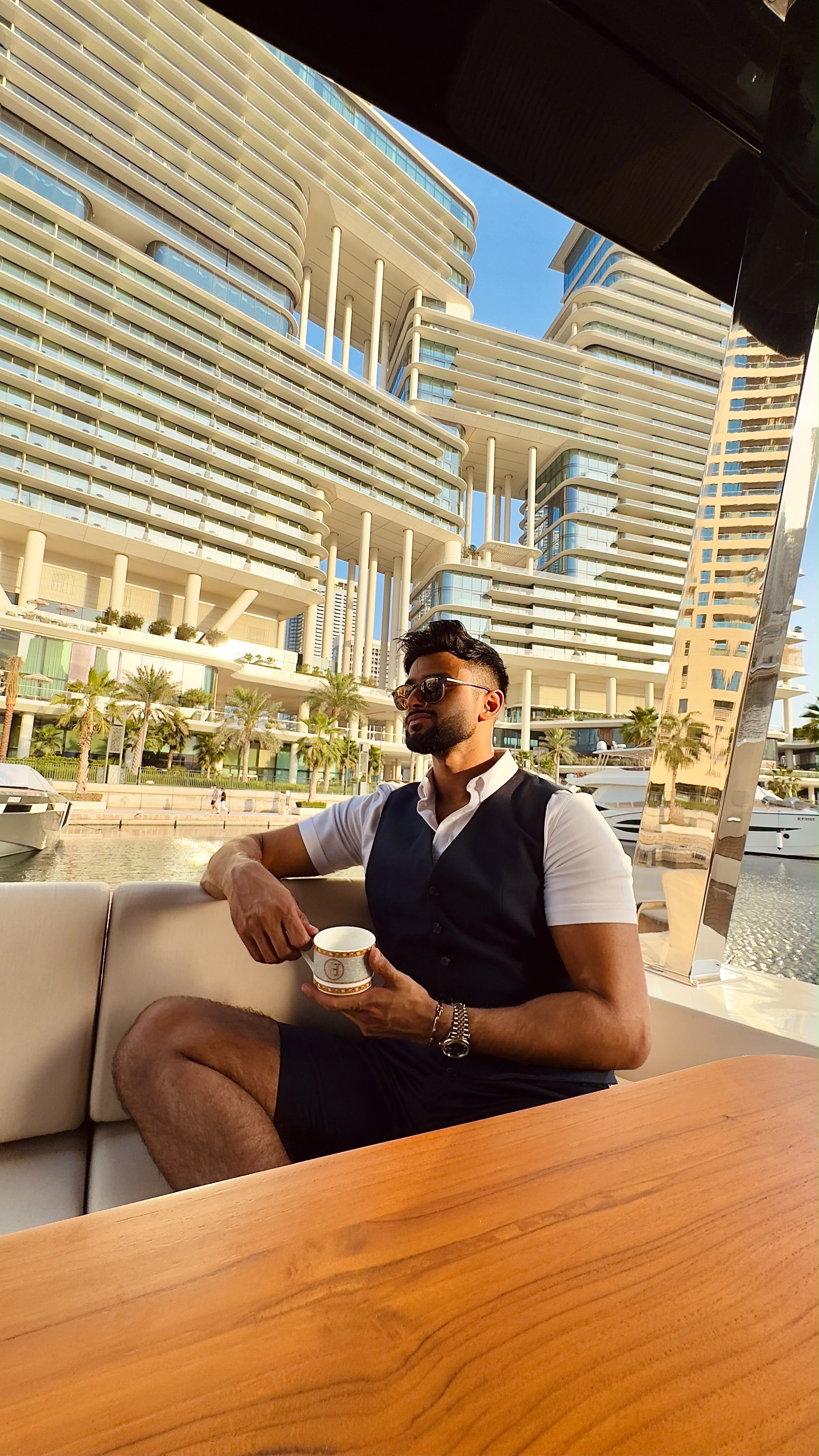 Zayyan Farran Amani seated outdoors